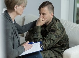 Counselor Helping a Veteran