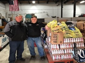 Ron Martin from the VFW donating packages to VSC & HRH